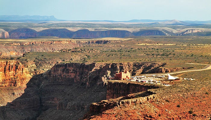 GCWest-Skywalk-Aerial_iStock_700 An aerial view of Grand Canyon West with the Skywalk on the edge of the rim.