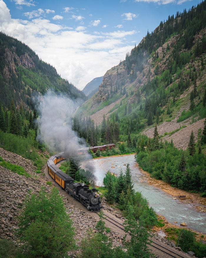 DurangoSilvertonRailroadTrain-valley_VisitDurango_700v The Durango and Silverton Railroad train in a valley near Durango