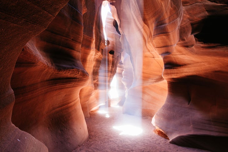 Light beams stream through Upper Antelope Canyon
