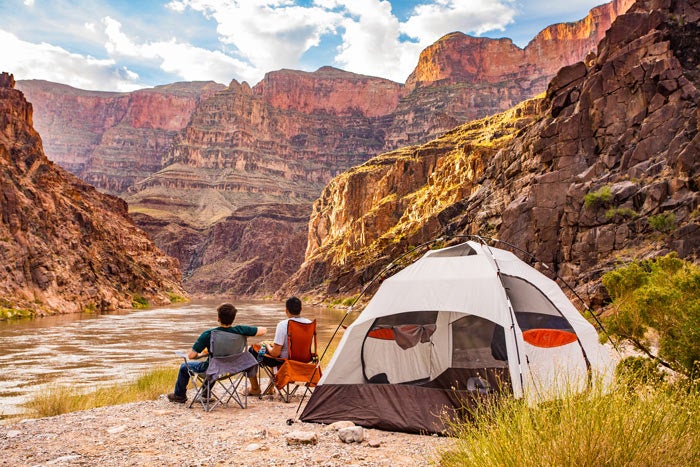 GrandCanyonWest-rafting-camping_courtesy_700 Camping along the river on a two-day Hualapai River Runners rafting trip
