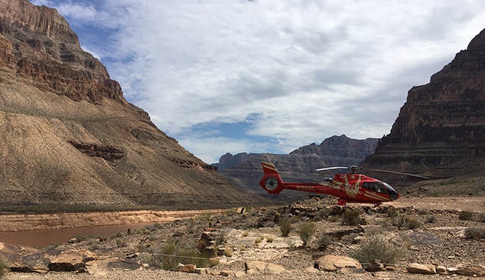 GCWest-Helicopter-landing_ToriPeglar_680 Helicopter waiting to take rafters back to the top of the canyon. Photo by Tori Peglar