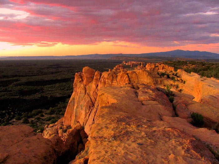 NM-ElMalpaisNM-sunset-SandstoneBluffsOverlook2_NPSJohnKuehnert_700 Sandstone Bluffs Overlook at New Mexico's El Malpais National Monument