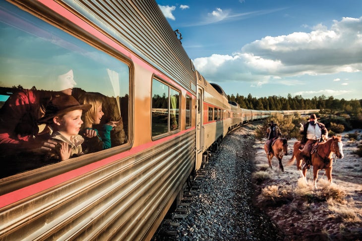 A family watches from the Grand Canyon Railway during a reenactment of a train robbery