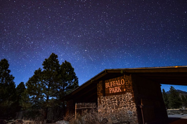 The stars shine in the dark skies over Buffalo Park in Flagstaff, Ariz.