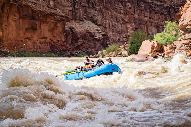 Negotiating rapids on the Colorado River while rafting in the Grand Canyon