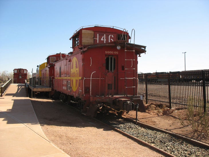 Old railway cars on Winslow's First Street Pathway